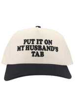 Load image into Gallery viewer, "Put It On My Husband's Tab" Puff Embroidered Trucker Hat - Black