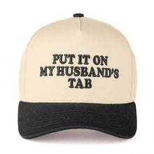 Load image into Gallery viewer, "Put It On My Husband's Tab" Puff Embroidered Trucker Hat - Black