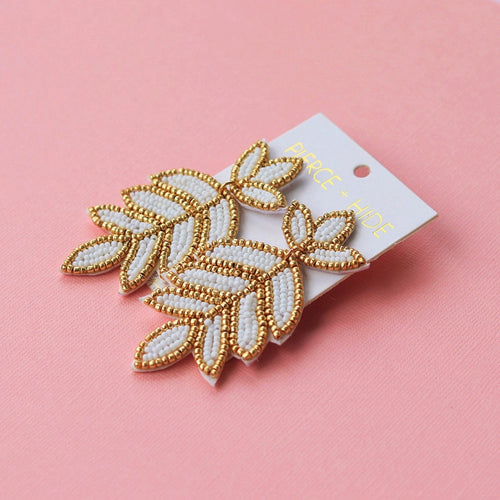 Pierce + Hide Beaded Fleur De Lis Leaf Drop Earrings - White