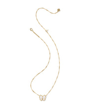 Load image into Gallery viewer, Kendra Scott Haley Gold Bow Short Pendant Necklace in Ivory Mother of Pearl